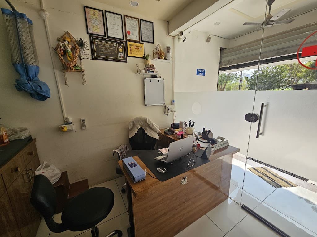 Interior view of Dr. Yash Makadiya's consultation room at Harikrushna Clinic.